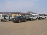 surrounded by 4x4 vehicles