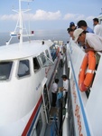 changing boats on the water